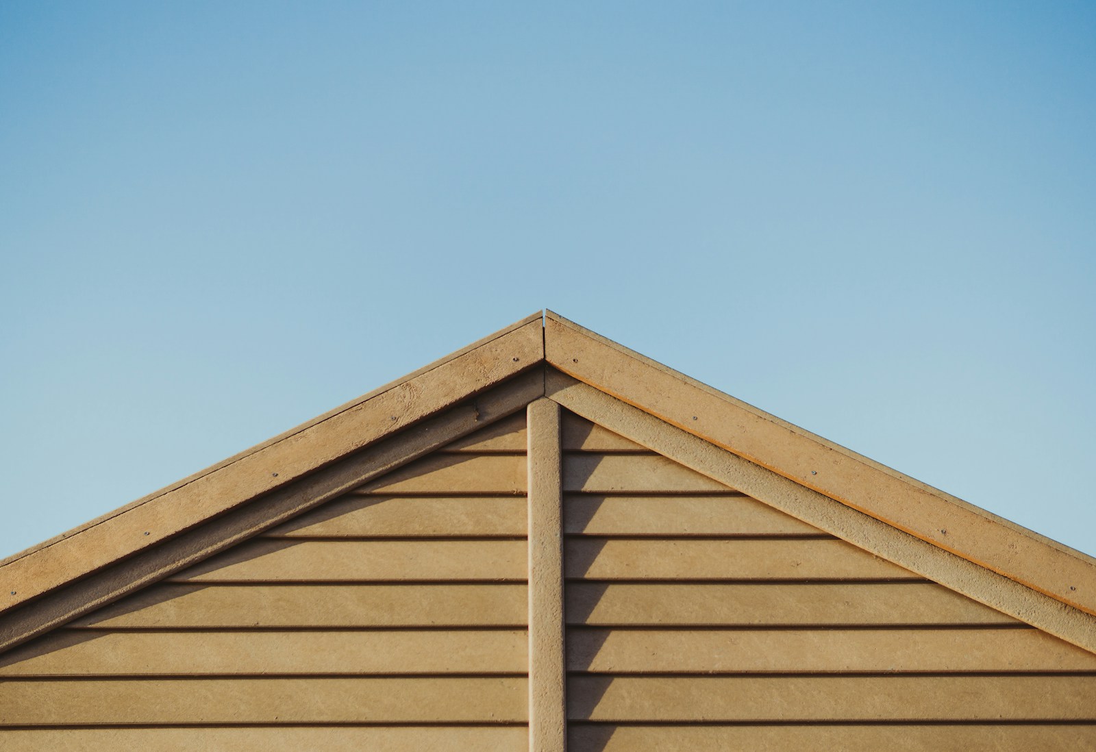 photo of brown wooden house roof